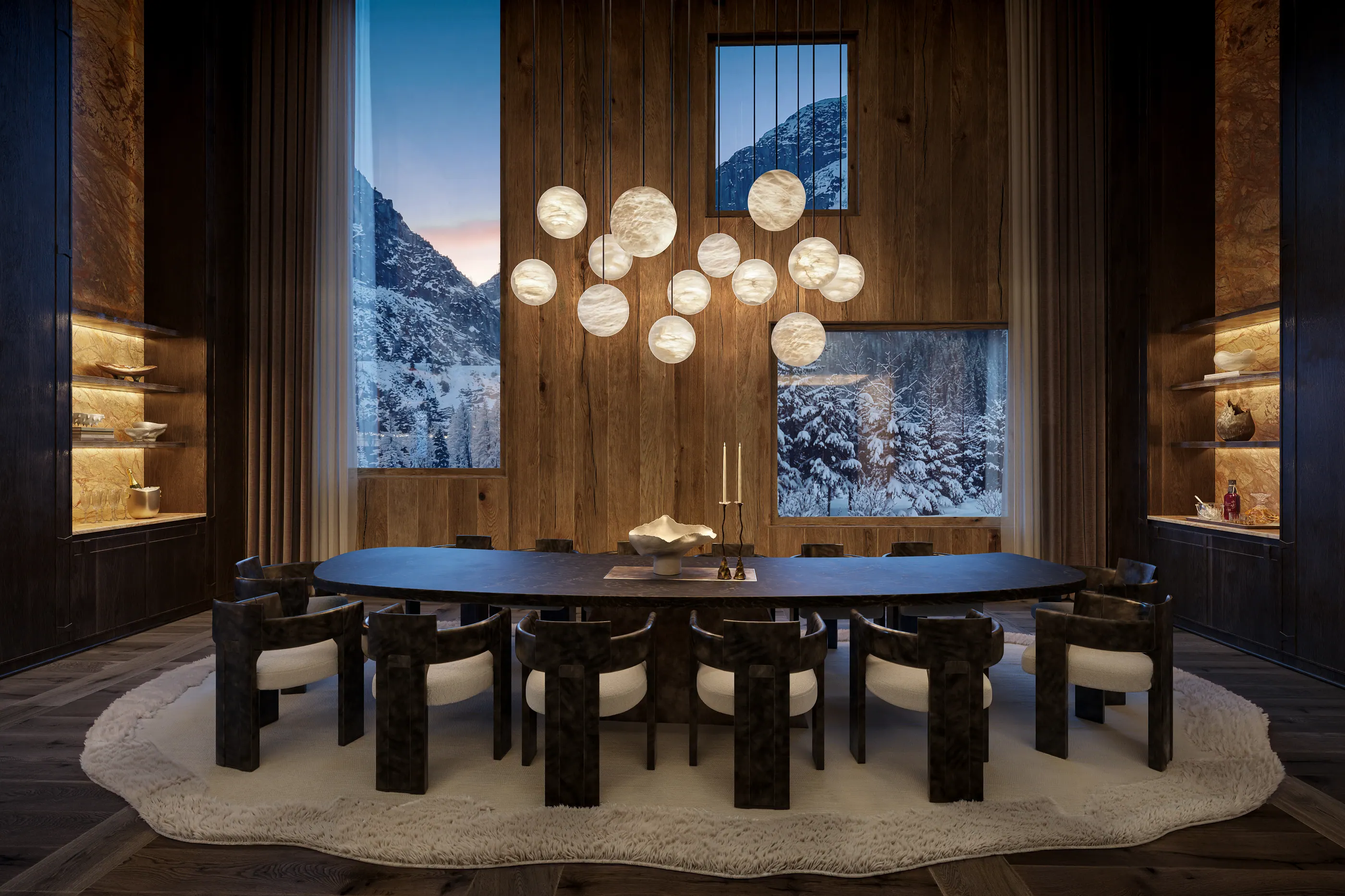 Private dining room with a stone table beneath alabaster globe lights